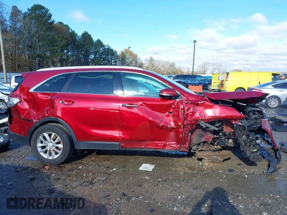 2016 Kia Sorento LX with VIN 5XYPG4A57GG129837, listed as a IAAI auction lot 41066768 with 69,717 mi miles. Bid and sale history available at carsss.com. Image 14.