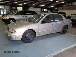 1996 Nissan Altima XE with VIN 1N4BU31D0TC137724, listed as a Copart auction lot 71544394 with 122,704 mi miles and Clean Title. Bid and sale history available at DreamBid. Image 1.