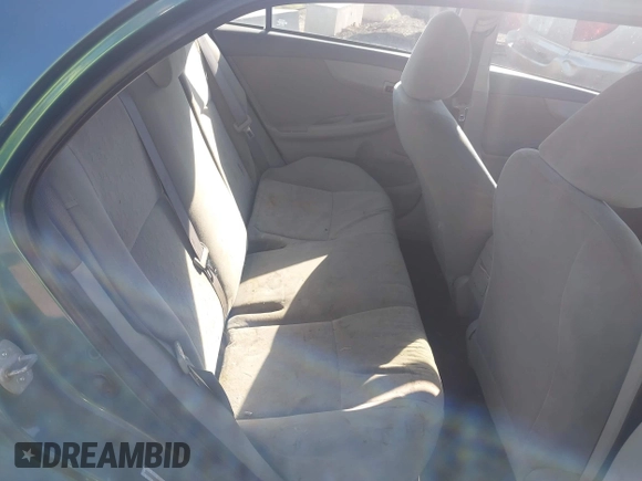 2009 Toyota Corolla with VIN 1NXBU40E39Z018168, listed as a IAAI auction lot 42661070 with 249,008 mi miles and . Bid and sale history available at DreamBid. Image 8.