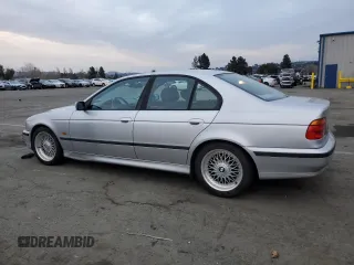 2000 BMW 5 Series 528iA with VIN WBADM6342YGV01382, listed as a Copart auction lot 44736415 with 167,919 mi miles and Salvage Title. Bid and sale history available at carsss.com. Image 2.