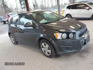 2014 Chevrolet Sonic LS with VIN 1G1JA6SH5E4140772, listed as a IAAI auction lot 41759700 with 115,021 mi miles and . Bid and sale history available at DreamBid. Image 1.
