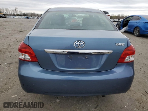 2012 Toyota Yaris with VIN JTDBT4K3XCL017521, listed as a Copart auction lot 51527255 with 173,731 mi miles and Salvage Title. Bid and sale history available at carsss.com. Image 6.