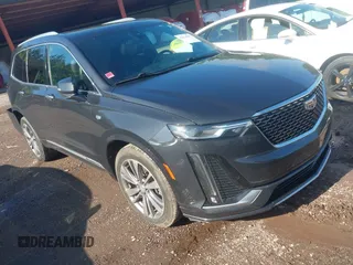 2020 Cadillac XT6 FWD Premium Luxury with VIN 1GYKPCRS0LZ206567, listed as a IAAI auction lot 42254511 with 80,443 mi miles and . Bid and sale history available at DreamBid. Image 1.