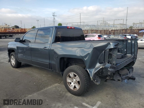 2017 Chevrolet Silverado 1500 LT with VIN 3GCPCREH6HG364570, listed as a Copart auction lot 52647185 with 132,473 mi miles and Salvage Title. Bid and sale history available at DreamBid. Image 2.