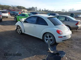 2008 Volkswagen New Beetle Coupe Triple White with VIN 3VWFW31C88M515319, listed as a IAAI auction lot 41564418 with 150,486 mi miles. Bid and sale history available at carsss.com. Image 3.
