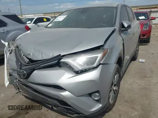 2018 Toyota RAV4 XLE z VIN 2T3WFREV5JW466294, wystawiony jako IAAI lot #41841436 z przebiegiem 132 150 mil mil oraz . Historia ofert i sprzedaży dostępna na DreamBid. Obrazek 18.