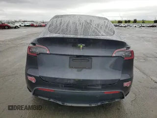 2024 Tesla Model Y with VIN 7SAYGDED6RF131193, listed as a Copart auction lot 47822735 with 10,007 mi miles and Salvage Title. Bid and sale history available at DreamBid. Image 6.