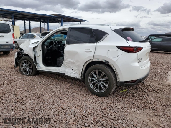 2019 Mazda CX-5 Signature with VIN JM3KFBEY3K0594305, listed as a Copart auction lot 49009235 with 73,993 mi miles and Salvage Title. Bid and sale history available at carsss.com. Image 2.