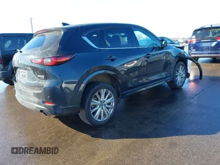 2023 Mazda CX-5 Signature with VIN JM3KFBXY2P0128644, listed as a IAAI auction lot 41753947 with 79,204 mi miles and . Bid and sale history available at carsss.com. Image 4.