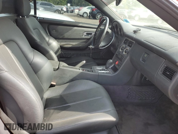 2002 Mercedes-Benz SLK-Class 2.3L Kompressor with VIN WDBKK49F22F249805, listed as a Copart auction lot 71058304 with 57,850 mi miles and Salvage Title. Bid and sale history available at carsss.com. Image 10.