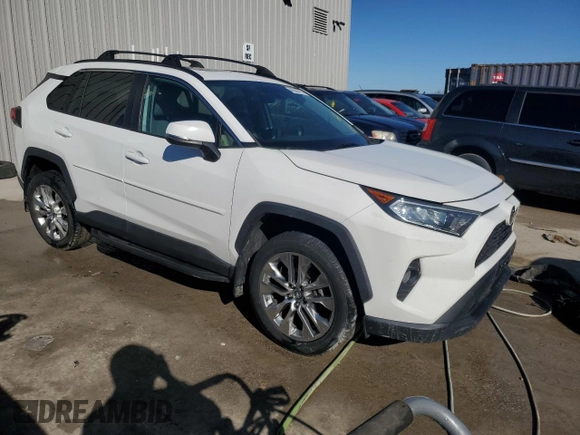 2019 Toyota RAV4 XLE Premium with VIN 2T3A1RFV5KW042879, listed as a Copart auction lot 46245415 with 92,238 mi miles and Salvage Title. Bid and sale history available at carsss.com. Image 4.