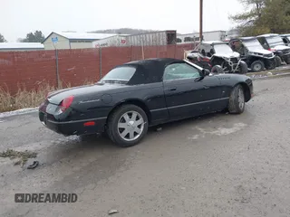 2003 Ford Thunderbird Deluxe with VIN 1FAHP60A53Y102920, listed as a IAAI auction lot 41228106 with 90,854 mi miles. Bid and sale history available at carsss.com. Image 4.
