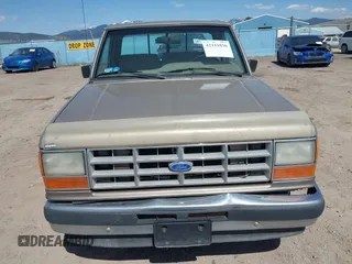 1990 Ford Ranger with VIN 1FTCR10T5LPB09214, listed as a IAAI auction lot 42111036 with 61,289 mi miles and . Bid and sale history available at DreamBid. Image 13.