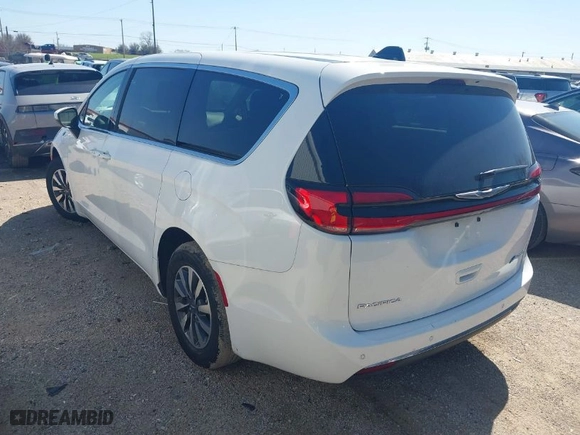 2023 Chrysler Pacifica Hybrid Touring L with VIN 2C4RC1L74PR579720, listed as a IAAI auction lot 41762445 with 38,095 mi miles. Bid and sale history available at carsss.com. Image 3.