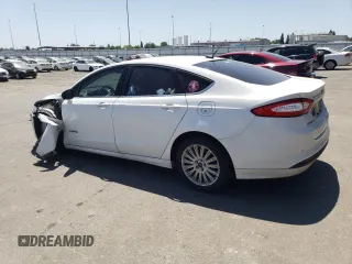 2016 Ford Fusion SE Hybrid with VIN 3FA6P0LU0GR342892, listed as a Copart auction lot 58869045 with 75,979 mi miles and Salvage title. Bid and sale history available at DreamBid. Image 2.
