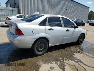 2007 Ford Focus S z VIN 1FAFP34N97W264411, wystawiony jako Copart lot #53251655 z przebiegiem 159 516 mil mil oraz Szkody całkowita. Historia ofert i sprzedaży dostępna na DreamBid. Obrazek 3.
