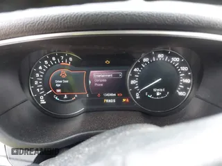 2015 Lincoln MKC z VIN 5LMCJ1A91FUJ13477, wystawiony jako IAAI lot #42042457 z przebiegiem 134 046 mil mil oraz . Historia ofert i sprzedaży dostępna na DreamBid. Obrazek 7.
