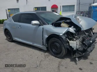 2014 Scion tC z VIN JTKJF5C70E3069777, wystawiony jako IAAI lot #42062698 z przebiegiem 113 961 mil mil oraz . Historia ofert i sprzedaży dostępna na DreamBid. Obrazek 1.