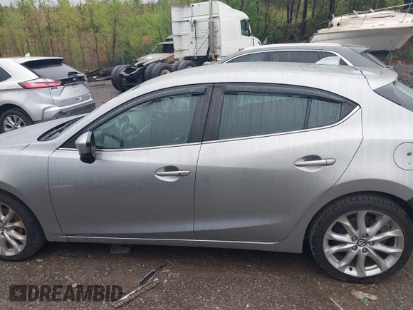 2014 Mazda 3 S Touring with VIN JM1BM1L30E1187539, listed as a IAAI auction lot 41974709 with 111,189 mi miles and . Bid and sale history available at DreamBid. Image 14.