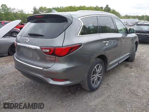 2020 Infiniti QX60 Luxe with VIN 5N1DL0MM1LC537478, listed as a IAAI auction lot 42323321 with 51,464 mi miles and . Bid and sale history available at DreamBid. Image 4.