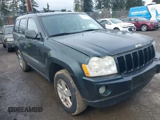 2005 Jeep Grand Cherokee Laredo with VIN 1J4HS48N45C524871, listed as a IAAI auction lot 41920807 with 169,633 mi miles and . Bid and sale history available at DreamBid. Image 1.