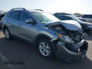 2013 Mazda CX-9 Touring with VIN JM3TB2CVXD0404625, listed as a IAAI auction lot 41737804 with 95,576 mi miles and . Bid and sale history available at carsss.com. Image 1.