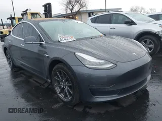 2018 Tesla Model 3 Long Range Battery with VIN 5YJ3E1EB1JF149423, listed as a IAAI auction lot 41896090 with 158,787 mi miles and . Bid and sale history available at DreamBid. Image 1.