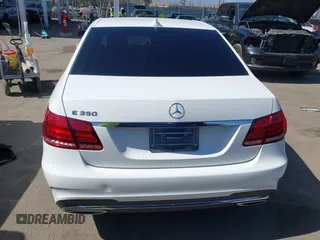 2014 Mercedes-Benz E 350 Sport with VIN WDDHF5KB8EB036758, listed as a IAAI auction lot 42550325 with 90,176 mi miles and . Bid and sale history available at DreamBid. Image 16.