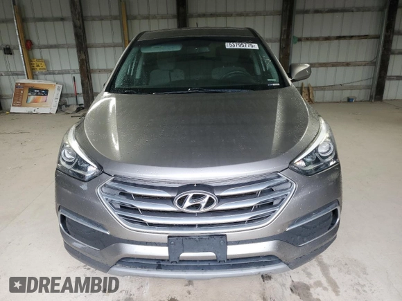 2018 Hyundai Santa Fe 2.4L z VIN 5NMZTDLB2JH096699, wystawiony jako Copart lot #53795775 z przebiegiem 165 794 mil mil oraz Szkoda całkowita • Salvage title. Historia ofert i sprzedaży dostępna na DreamBid. Obrazek 5.