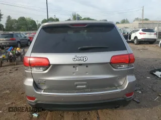2014 Jeep Grand Cherokee Limited with VIN 1C4RJFBG8EC496303, listed as a Copart auction lot 56215195 with 129,269 mi miles and Salvage Title. Bid and sale history available at DreamBid. Image 6.