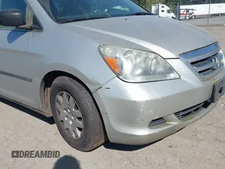 2006 Honda Odyssey LX with VIN 5FNRL38236B127129, listed as a IAAI auction lot 42041994 with 282,313 mi miles. Bid and sale history available at carsss.com. Image 6.