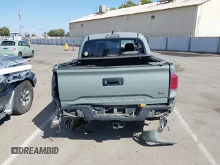2022 Toyota Tacoma SR with VIN 3TMCZ5AN0NM489420, listed as a IAAI auction lot 42597175 with 129,340 mi miles and . Bid and sale history available at DreamBid. Image 17.