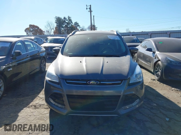 2014 Ford Escape Titanium with VIN 1FMCU9J94EUC50534, listed as a IAAI auction lot 41040341 with 115,502 mi miles. Bid and sale history available at carsss.com. Image 11.