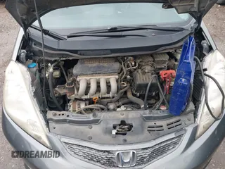 2011 Honda Fit Sport z VIN JHMGE8H51BC003715, wystawiony jako IAAI lot #42108476 z przebiegiem 174 228 mil mil oraz . Historia ofert i sprzedaży dostępna na DreamBid. Obrazek 10.