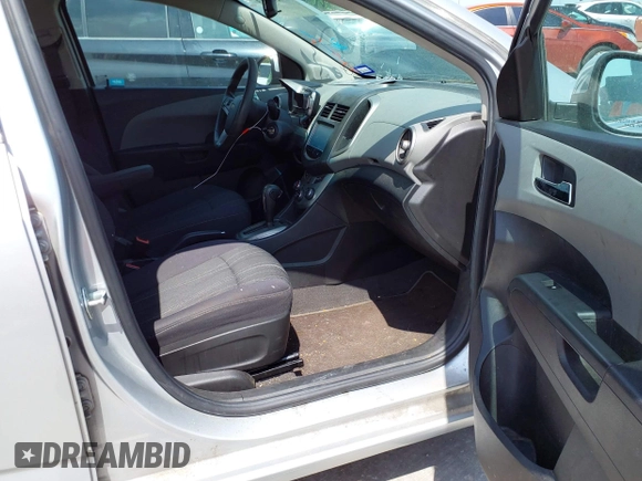 2014 Chevrolet Sonic LT with VIN 1G1JC5SH0E4210327, listed as a IAAI auction lot 42069313 with 94,506 mi miles and . Bid and sale history available at DreamBid. Image 5.