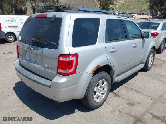 2009 Ford Escape Hybrid with VIN 1FMCU49309KC11542, listed as a IAAI auction lot 42028593 with 168,573 mi miles. Bid and sale history available at carsss.com. Image 4.
