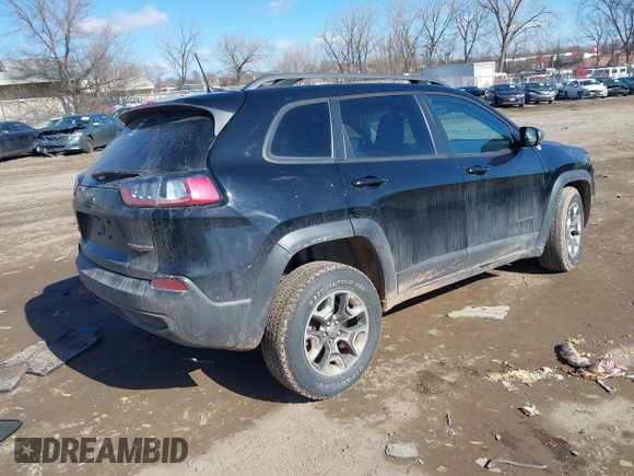 2019 Jeep Cherokee Trailhawk with VIN 1C4PJMBX6KD399568, listed as a IAAI auction lot 41645861 with 75,807 mi miles and . Bid and sale history available at DreamBid. Image 4.