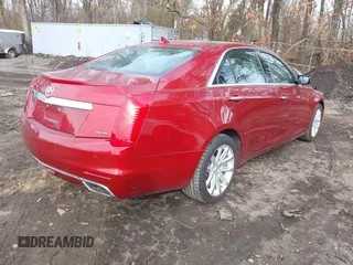 2014 Cadillac CTS Luxury AWD with VIN 1G6AX5S38E0146872, listed as a IAAI auction lot 41663642 with 56,787 mi miles and . Bid and sale history available at DreamBid. Image 4.