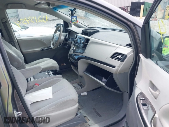 2013 Toyota Sienna LE AAS with VIN 5TDKK3DC0DS301315, listed as a IAAI auction lot 42215454 with 328,507 mi miles and . Bid and sale history available at DreamBid. Image 5.