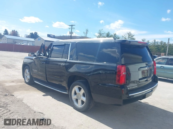 2015 Chevrolet Suburban LTZ with VIN 1GNSKKKC9FR280390, listed as a IAAI auction lot 41882449 with 80,499 mi miles and . Bid and sale history available at DreamBid. Image 3.