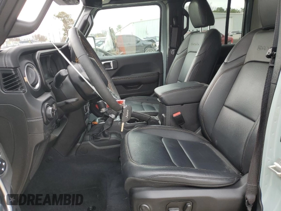 2024 Jeep Wrangler Sahara with VIN 1C4PJXENXRW153777, listed as a Copart auction lot 46066605 with 16,707 mi miles and Salvage Title. Bid and sale history available at DreamBid. Image 7.