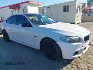2012 BMW 5 Series 528i with VIN WBAXG5C51CDX01641, listed as a IAAI auction lot 41667841 with 124,981 mi miles. Bid and sale history available at carsss.com. Image 1.