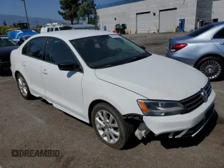 2015 Volkswagen Jetta Sport with VIN 3VWB17AJ4FM356055, listed as a Copart auction lot 62704135 with 123,023 mi miles and Salvage title. Bid and sale history available at DreamBid. Image 4.