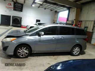 2013 Mazda 5 Sport with VIN JM1CW2BL5D0156684, listed as a IAAI auction lot 41966696 with 121,654 mi miles and . Bid and sale history available at DreamBid. Image 15.