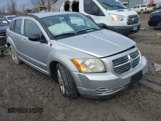 2010 Dodge Caliber SXT z VIN 1B3CB4HA0AD575917, wystawiony jako IAAI lot #41709405 z przebiegiem 213 641 mil mil oraz . Historia ofert i sprzedaży dostępna na DreamBid. Obrazek 1.