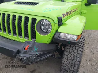 2021 Jeep Gladiator Mojave с VIN 1C6JJTEG1ML618948, выставлен на аукционе IAAI как лот 41955208 с пробегом 37 735 миль миль и . История ставок и продаж доступна на DreamBid. Изображение 6.