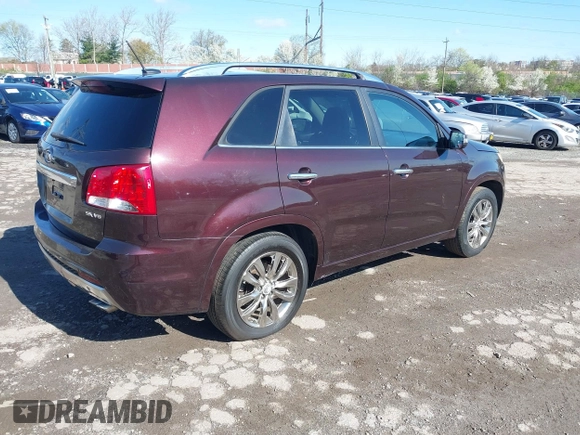 2011 Kia Sorento SX with VIN 5XYKW4A27BG163580, listed as a IAAI auction lot 41987362 with 172,097 mi miles. Bid and sale history available at carsss.com. Image 4.