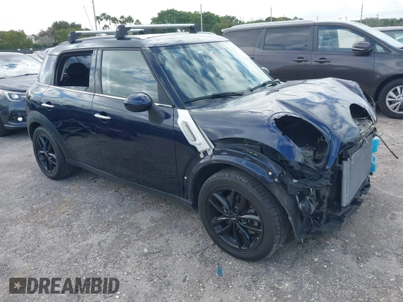 2013 MINI Countryman with VIN WMWZB3C58DWM07817, listed as a IAAI auction lot 41962291 with 60,763 mi miles and . Bid and sale history available at DreamBid. Image 1.