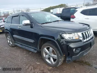 2013 Jeep Grand Cherokee Limited with VIN 1C4RJFBT9DC592257, listed as a IAAI auction lot 40955180 with 130,038 mi miles. Bid and sale history available at carsss.com. Image 1.