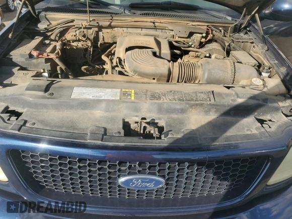 2003 Ford F-150 XL with VIN 1FTRX17L13NA95202, listed as a Copart auction lot 87766385 with 124,961 mi miles and Salvage Title. Bid and sale history available at carsss.com. Image 11.